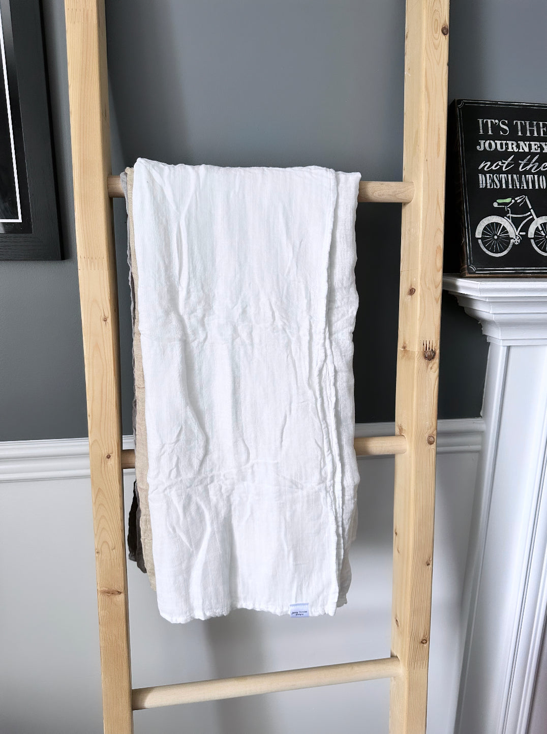 White muslin swaddle blanket