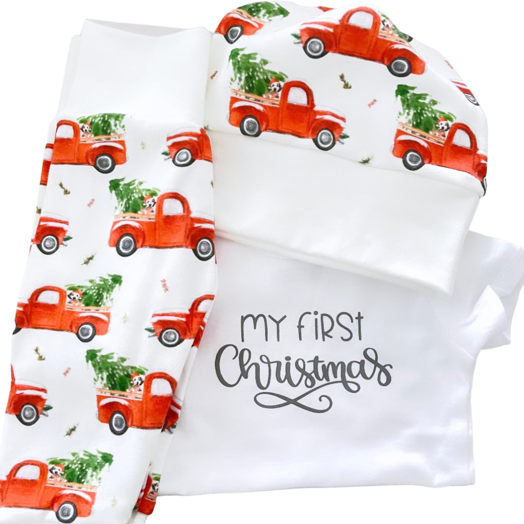 Tenue de petits camions rouges