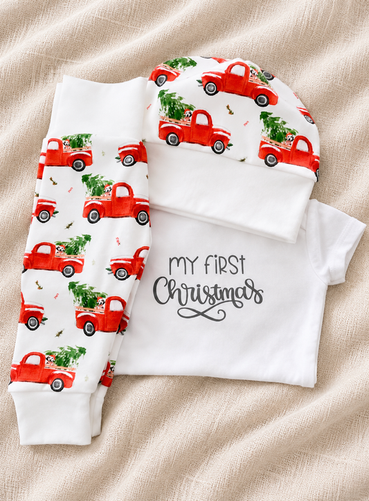 Tenue de petits camions rouges
